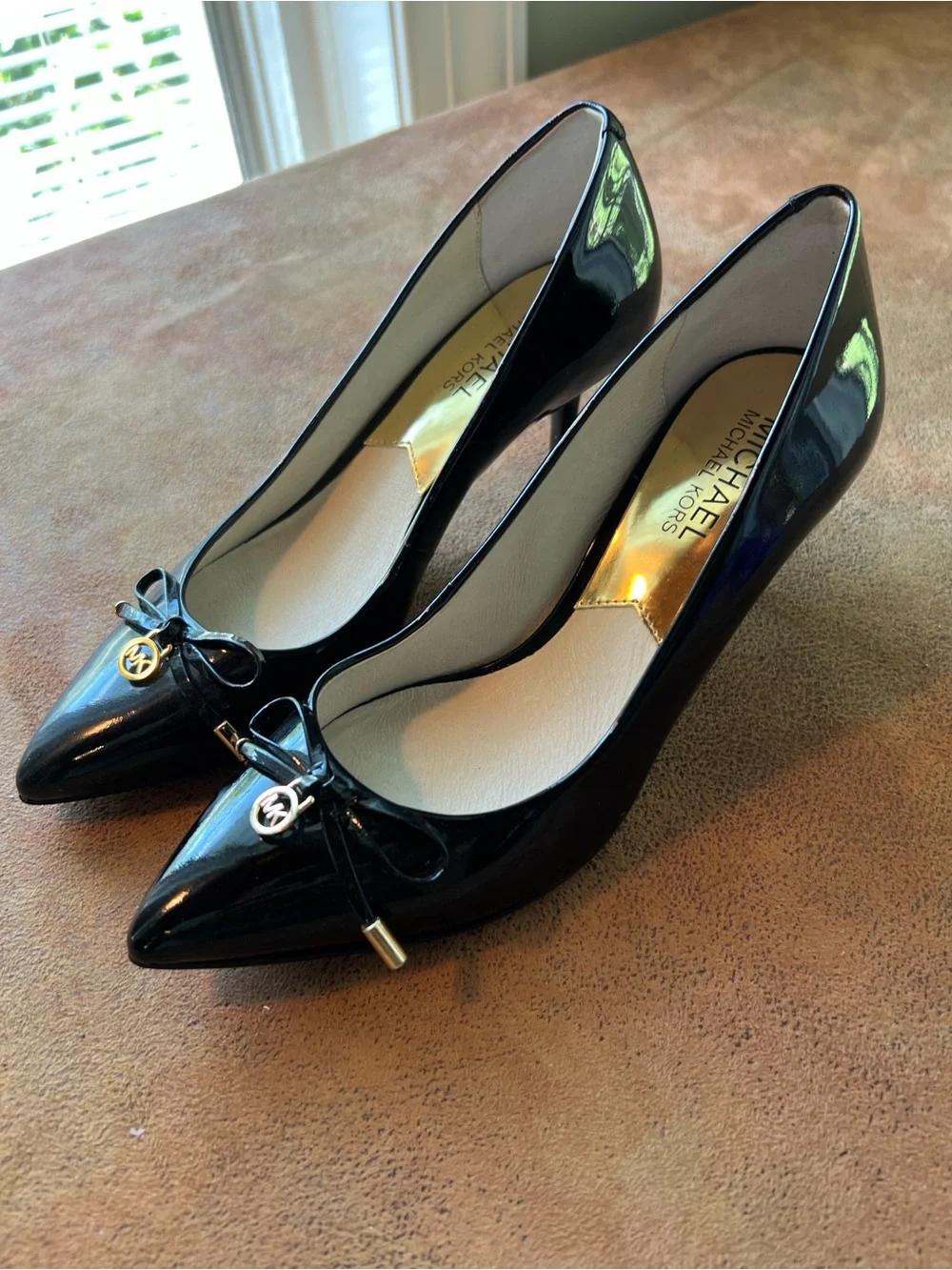 Michael Kors Black Patent Pointed-Toe Heels with Gold MK Charm Bow size 6